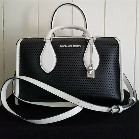 white michael kors bag dirty|Michael Kors black shoulder purse.